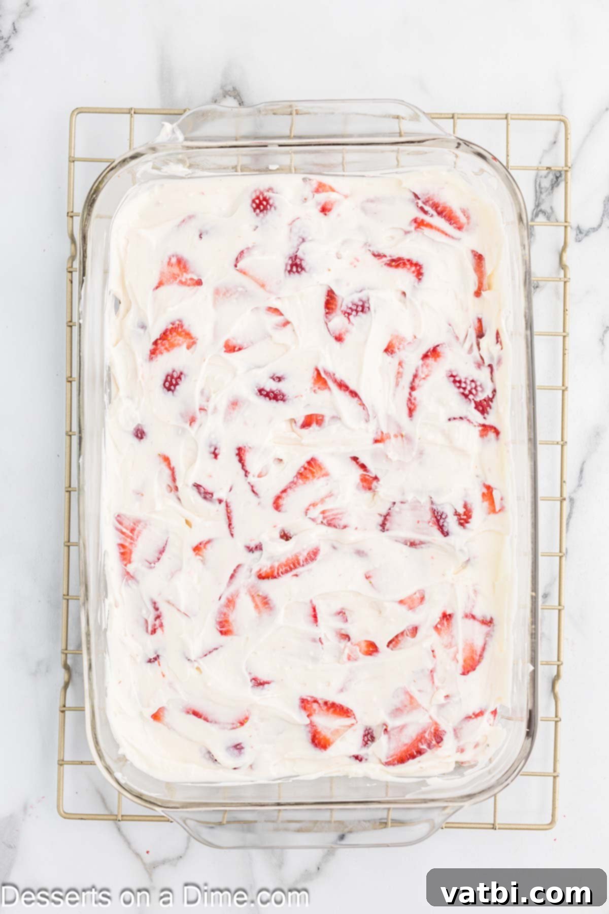 Easy Strawberry Crunch Bars 10 Strawberry cream cheese mixture spread evenly on top of the cooled cookie crust.