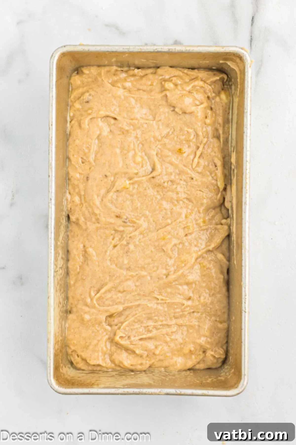 Brown Sugar Banana Bread 7 Mixture poured into loaf pan.