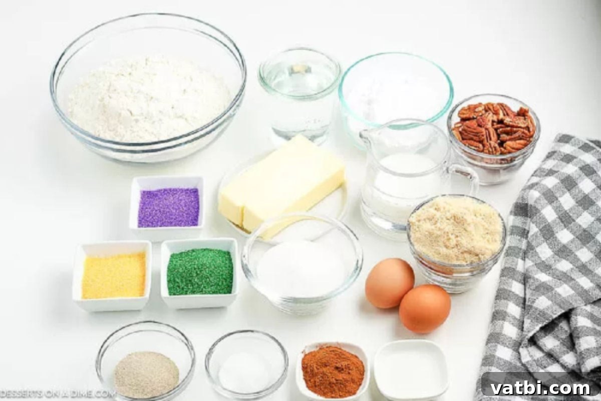 Learn how to make this Mardi Gras king cake recipe, perfect for a celebration. This cake is delicious and adorned with festive colors. Ingredients for King Cake including yeast, water, sugar, flour, milk, salt, eggs, butter, brown sugar, cinnamon, pecans, powdered sugar, vanilla, mini baby, and colored sugar