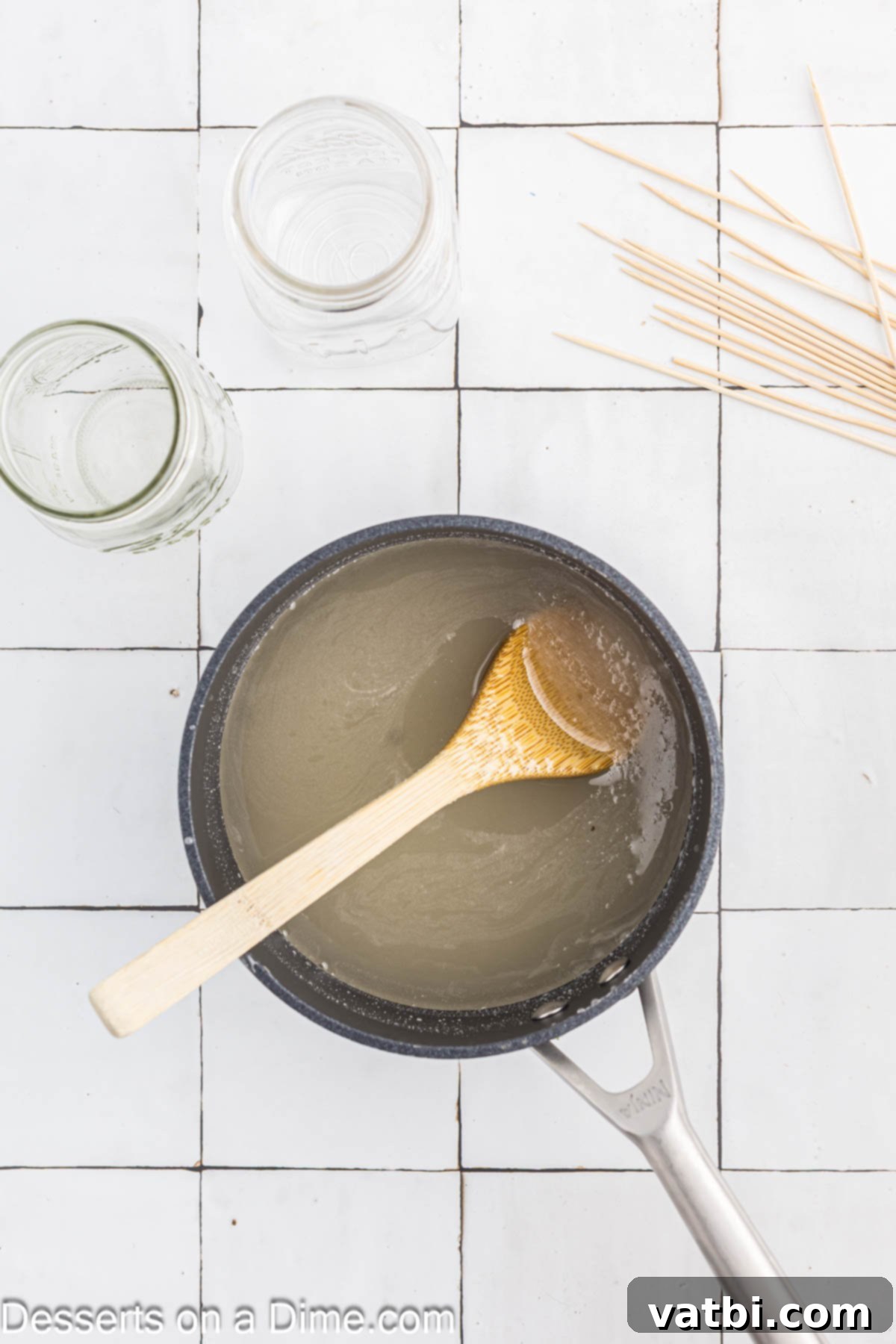 Grow Your Own Rock Candy Crystals 4 Granulated sugar and water combined in a saucepan, beginning to heat.