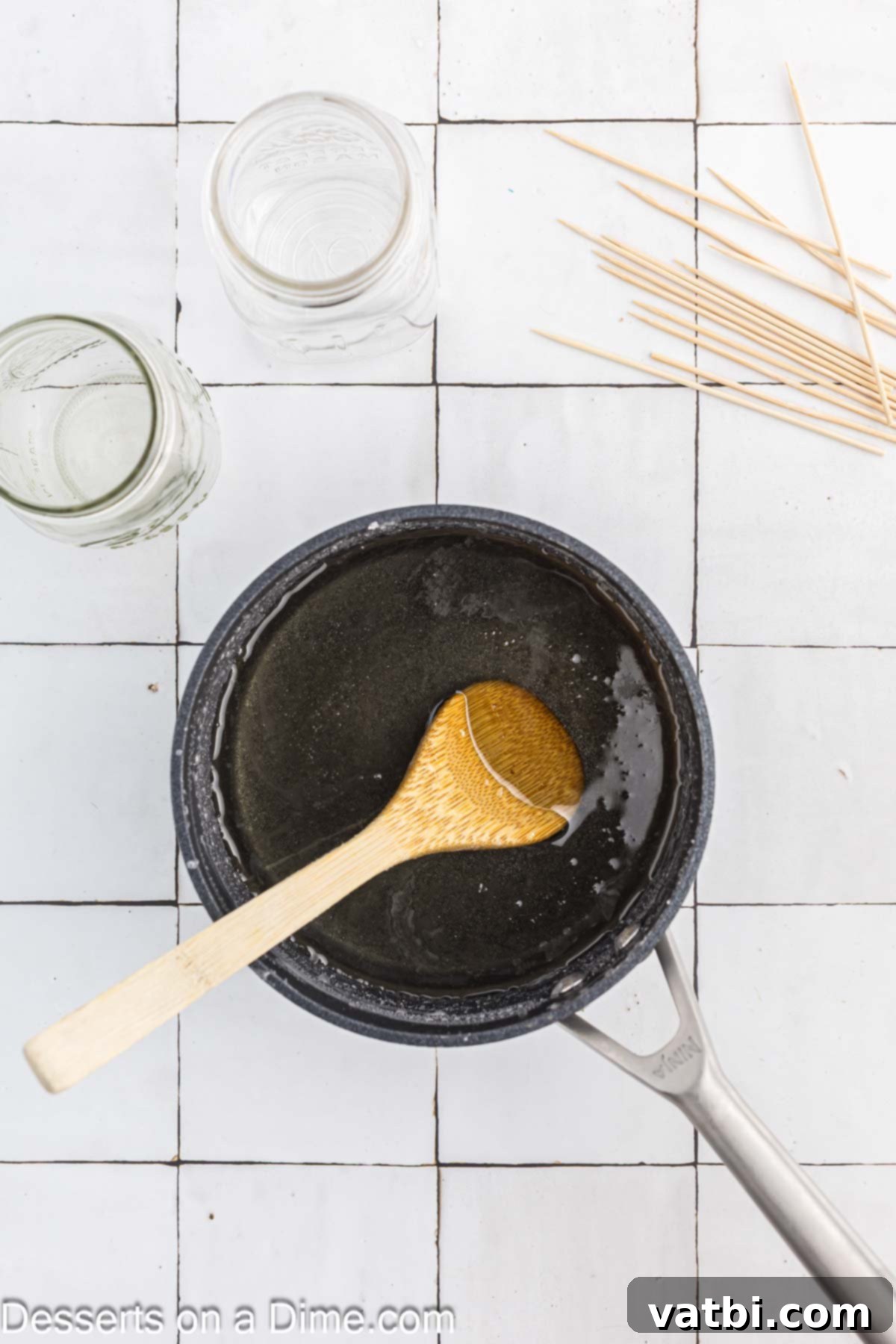Grow Your Own Rock Candy Crystals 5 Clear sugar syrup in a pan after sugar has completely dissolved.