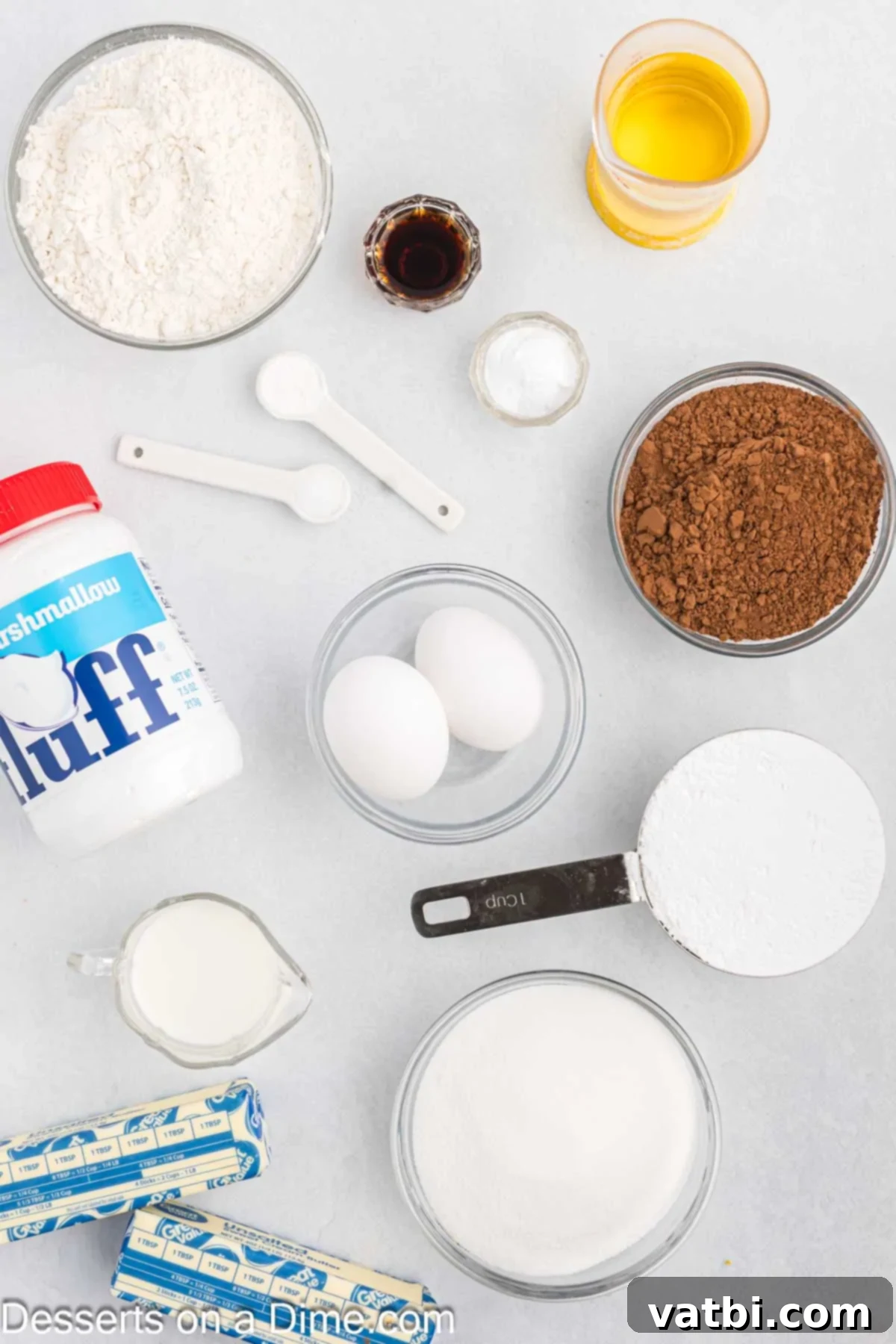 Decadent Whoopie Pies 3 Ingredients for whoopie pie recipe - flour, cocoa, baking soda, eggs, milk, butter, marshmallow fluff.
