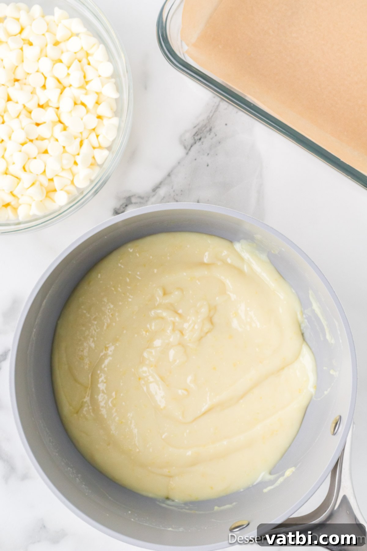 The lemon fudge mixture fully combined and smooth in the saucepan. 