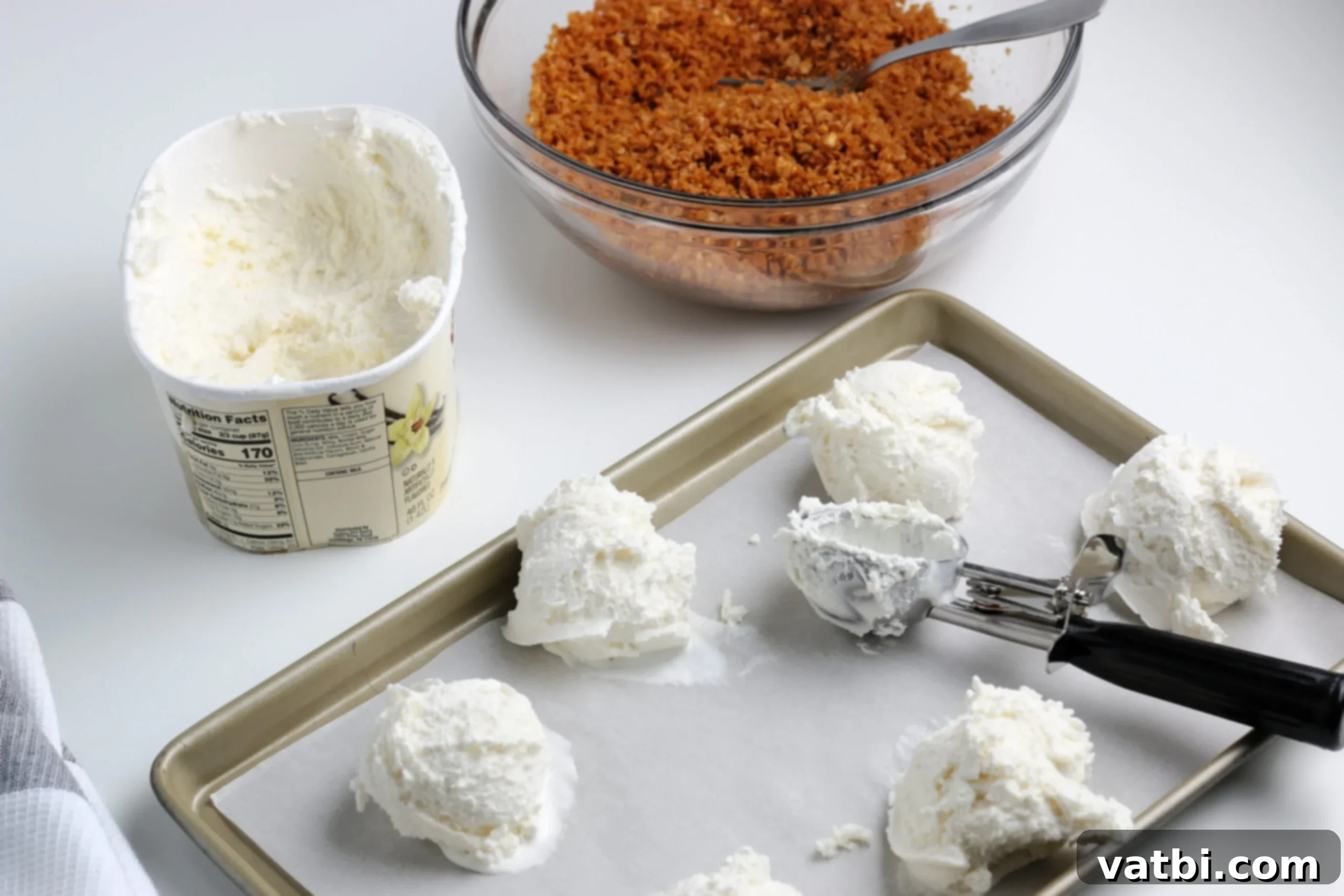 Crispy Cream Dream 4 Scoops of ice cream on baking sheet.