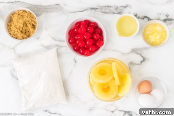 Caramel Pineapple Crown Cupcakes 3 Ingredients needed - pineapple slices, cake mix, oil, eggs, butter, brown sugar, cherries