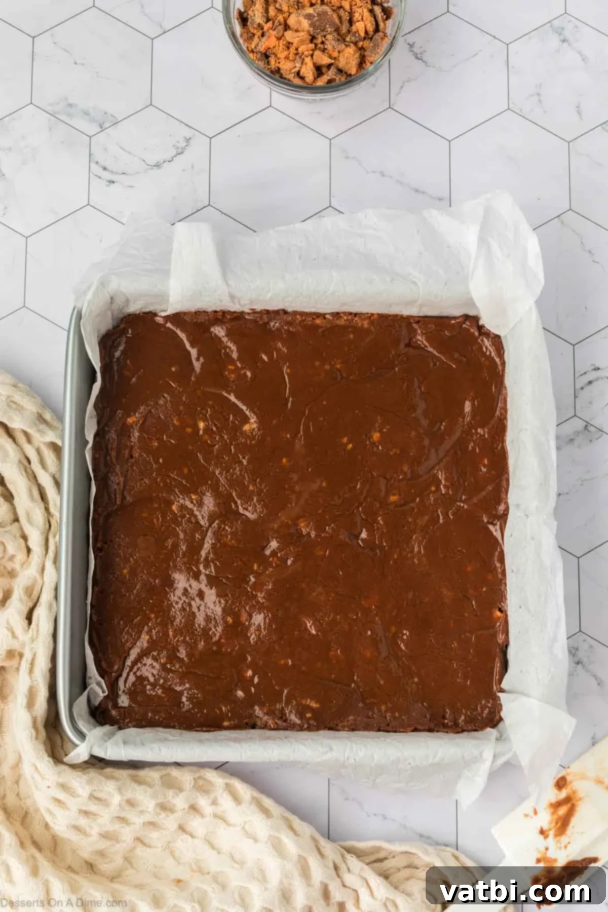 Fudge mixture spread into pan. 