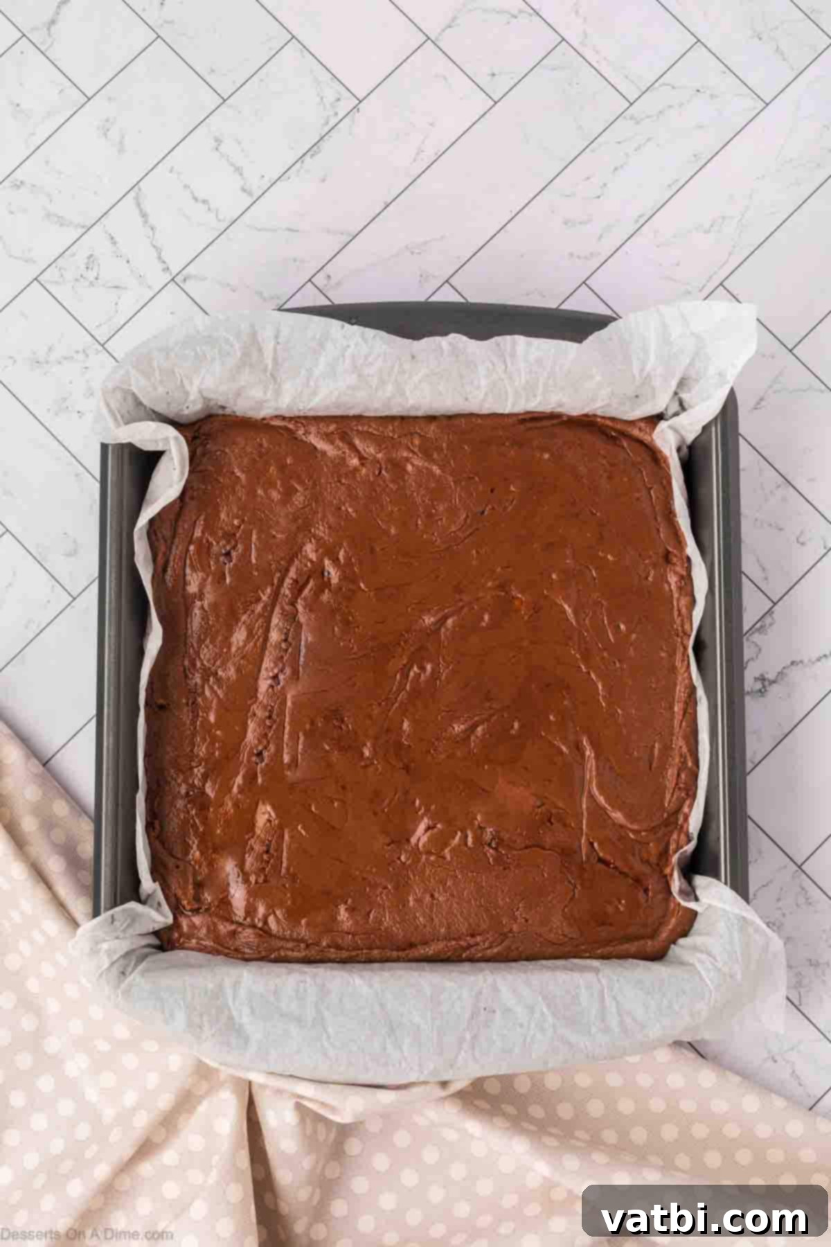 Fudge mixture spread into pan.