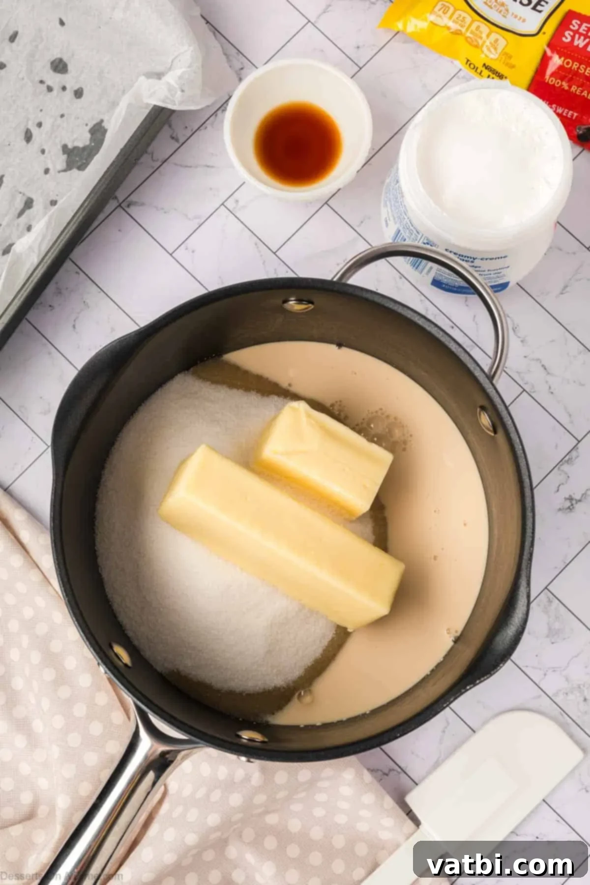 Butter, sugar and sweetened condensed milk in a pan.