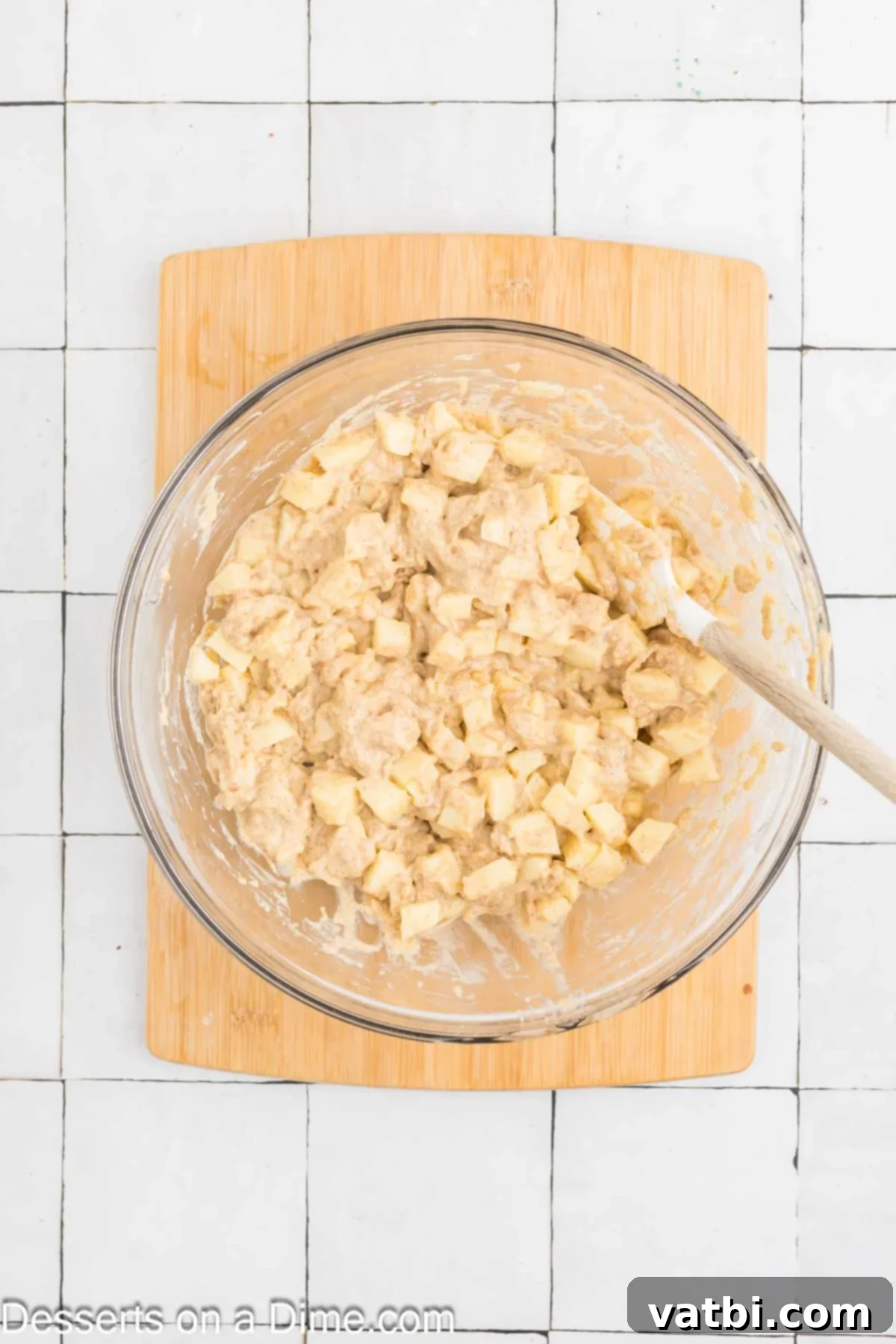 Apples mixed into the bowl. 