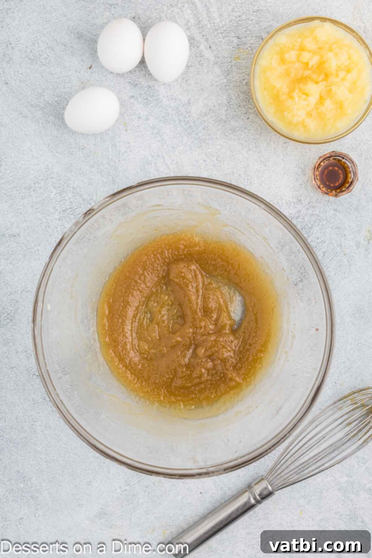 Tropical Sunshine Loaf 4 Melted butter combined with brown sugar in a bowl, ready to be mixed into the batter.