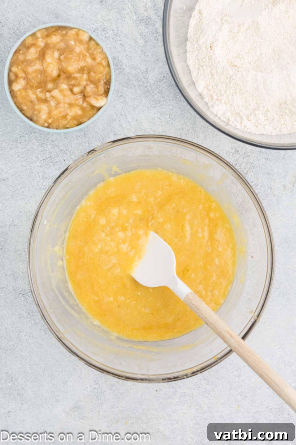 Tropical Sunshine Loaf 6 Crushed pineapple folded into the wet ingredients, adding moisture and tropical flavor.