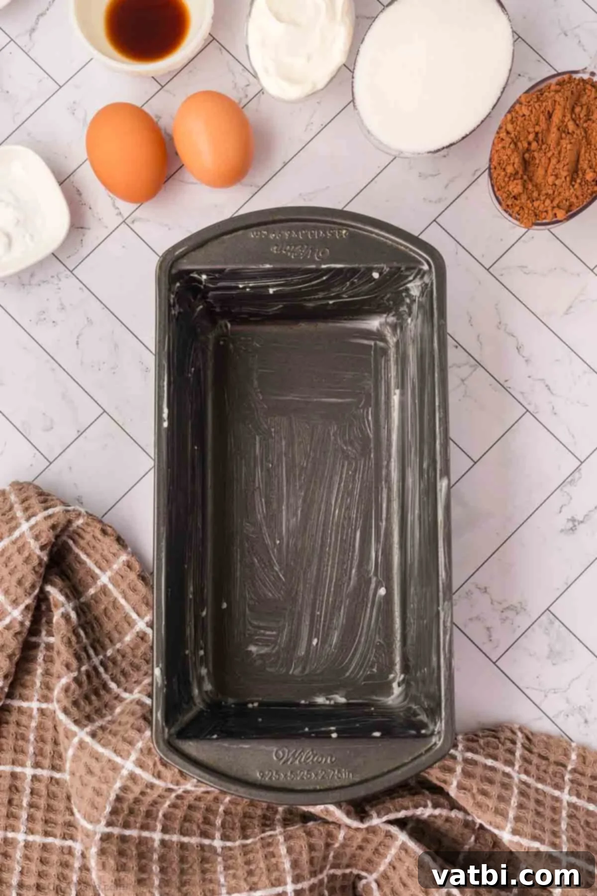 Chocolate Zucchini Bliss 4 Loaf pan greased and ready for baking.