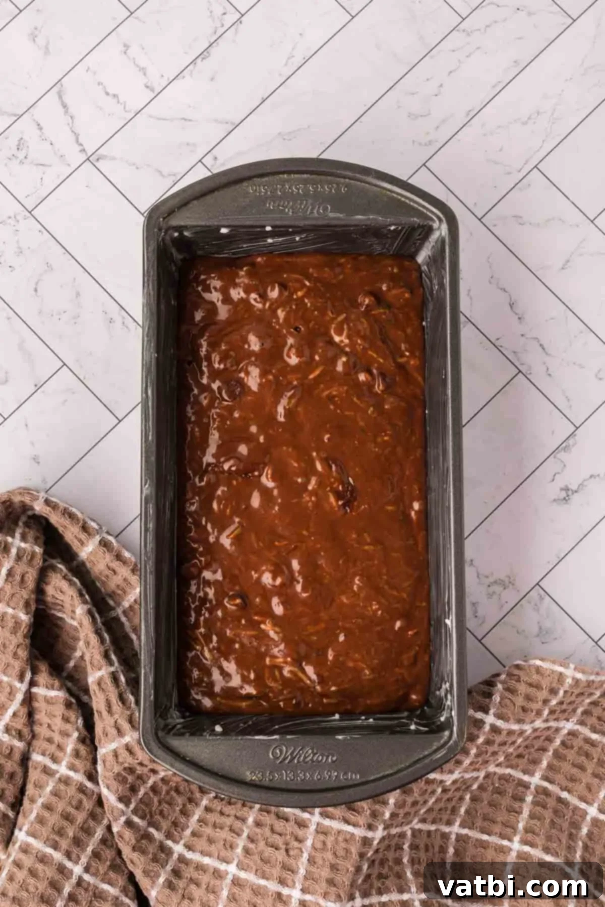 Chocolate Zucchini Bliss 10 Batter evenly spread into the prepared loaf pan.