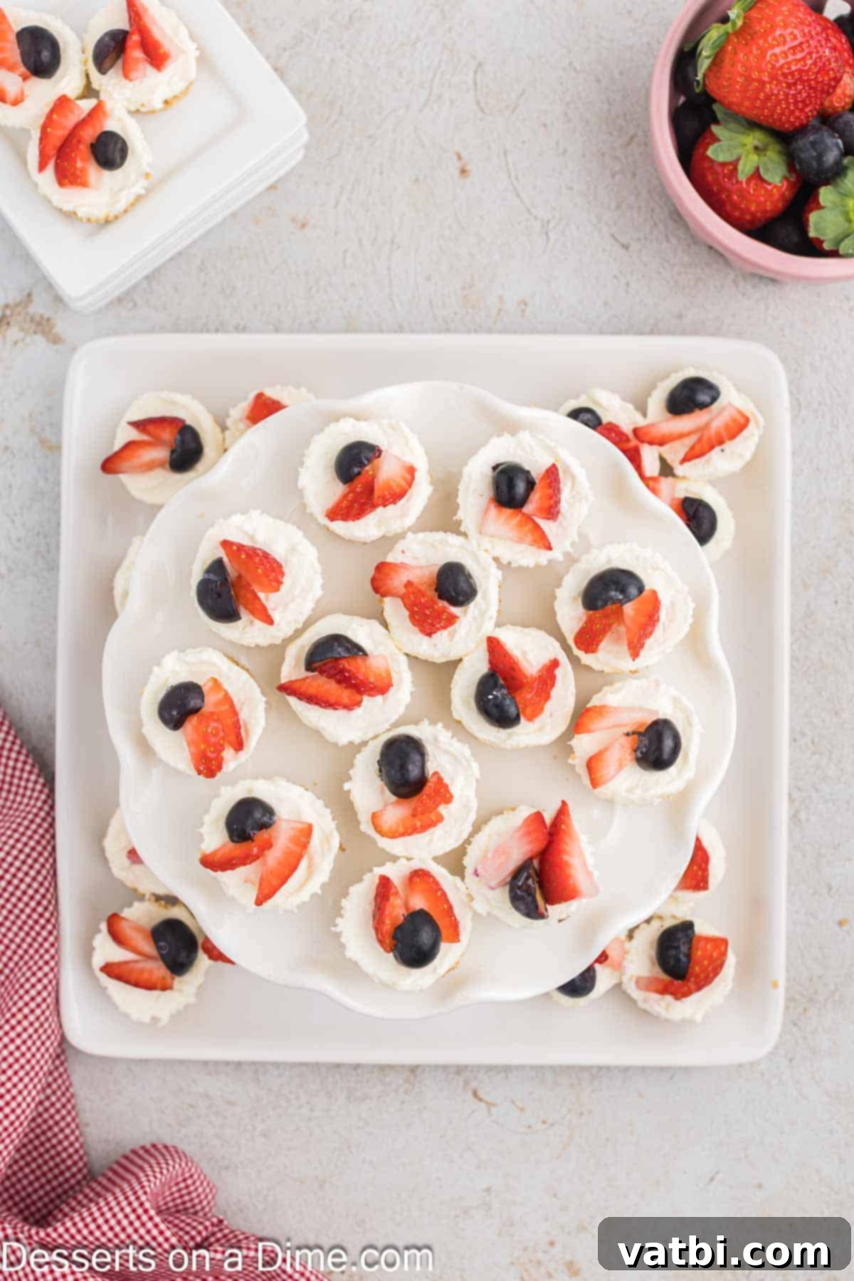 Mini cheesecakes beautifully arranged on a serving platter, ready to be enjoyed.