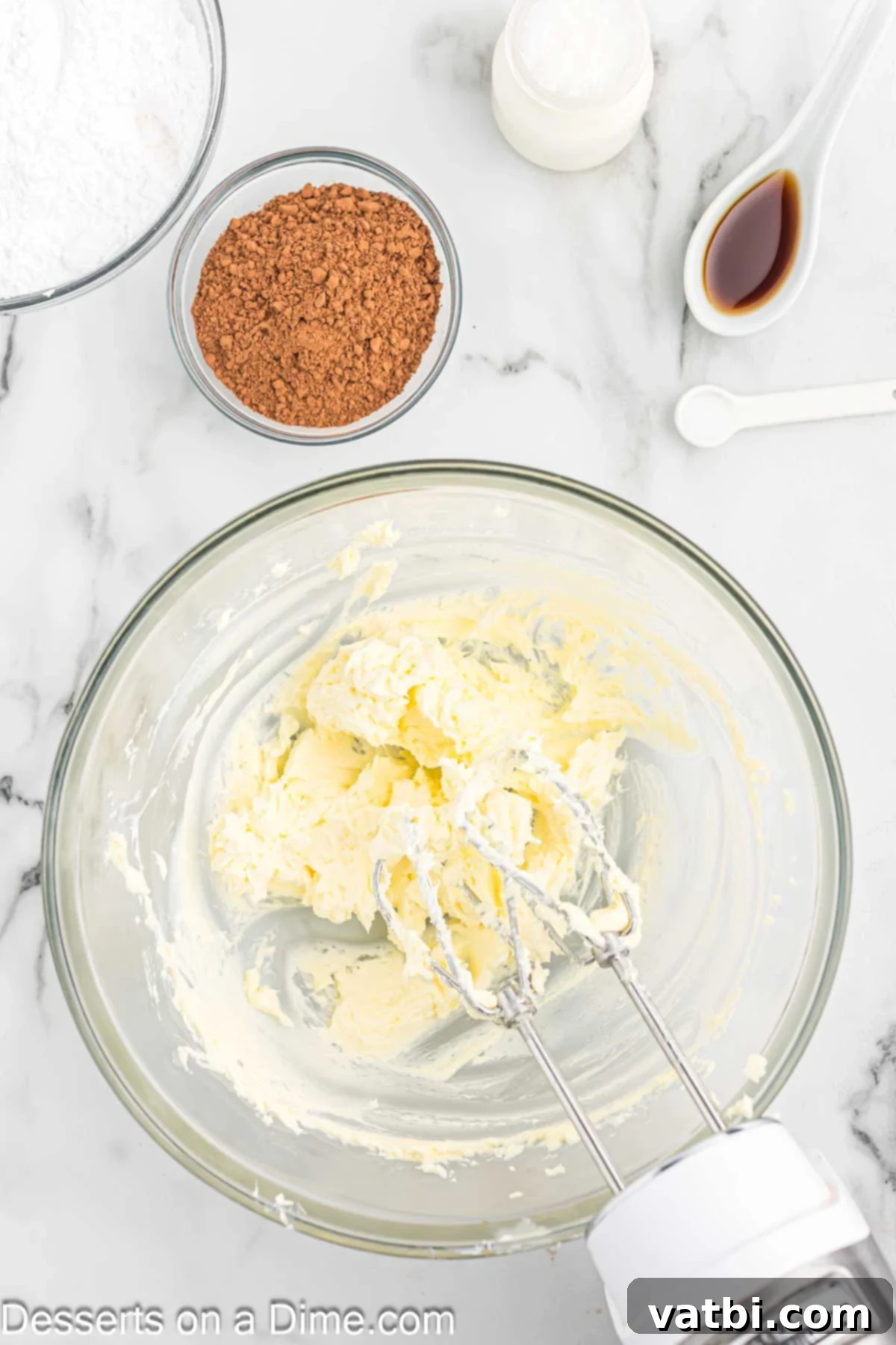 Butter beat in mixing bowl.
