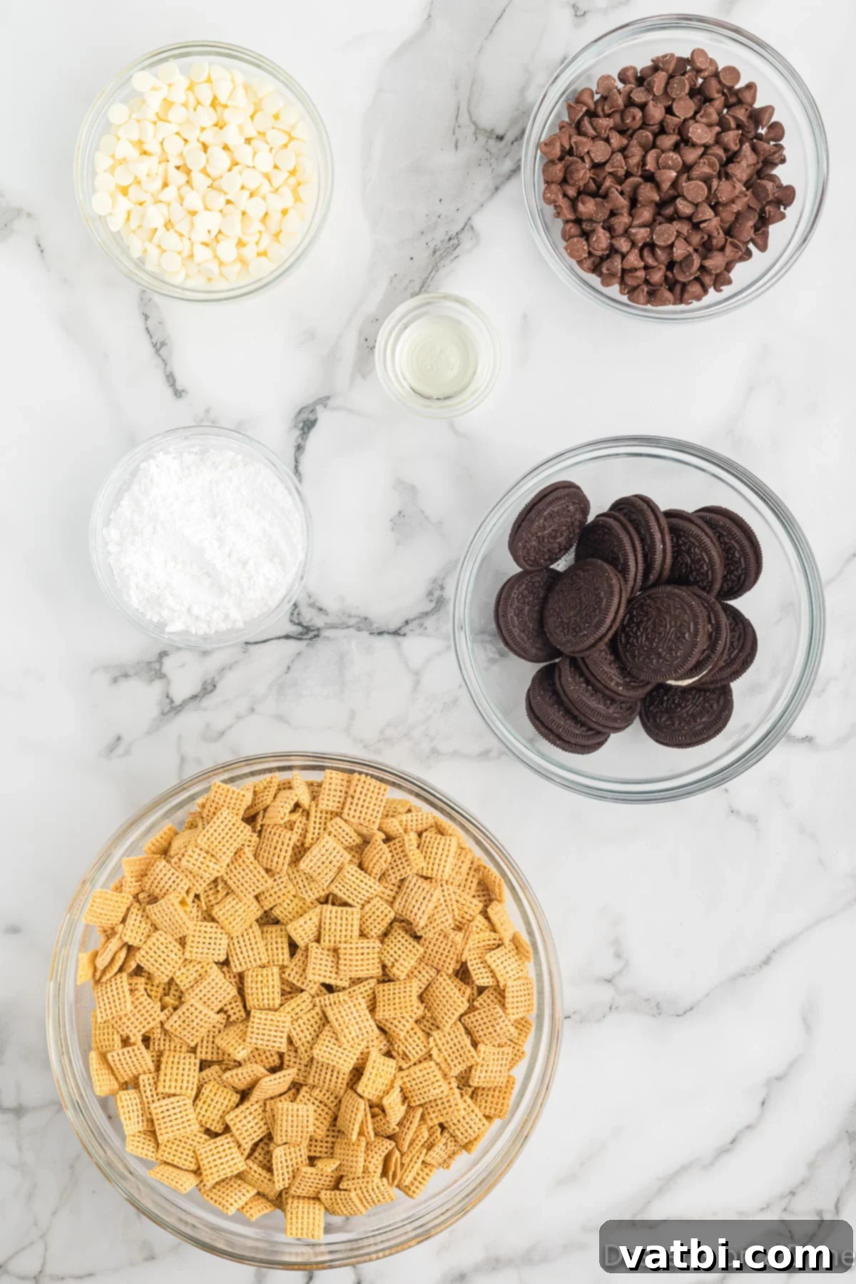 Oreo Muddy Buddies 3 Ingredients for Oreo Puppy chow - chex cereal, oreos, powdered sugar, chocolate